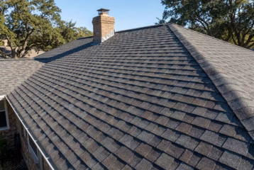 Residential home with a well-maintained asphalt shingle roof