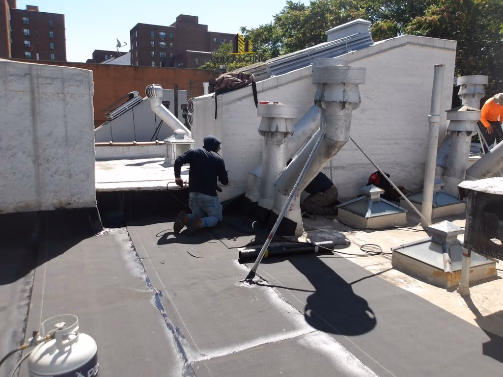 flat roof restoration east village manhattan with Johns manville roofing