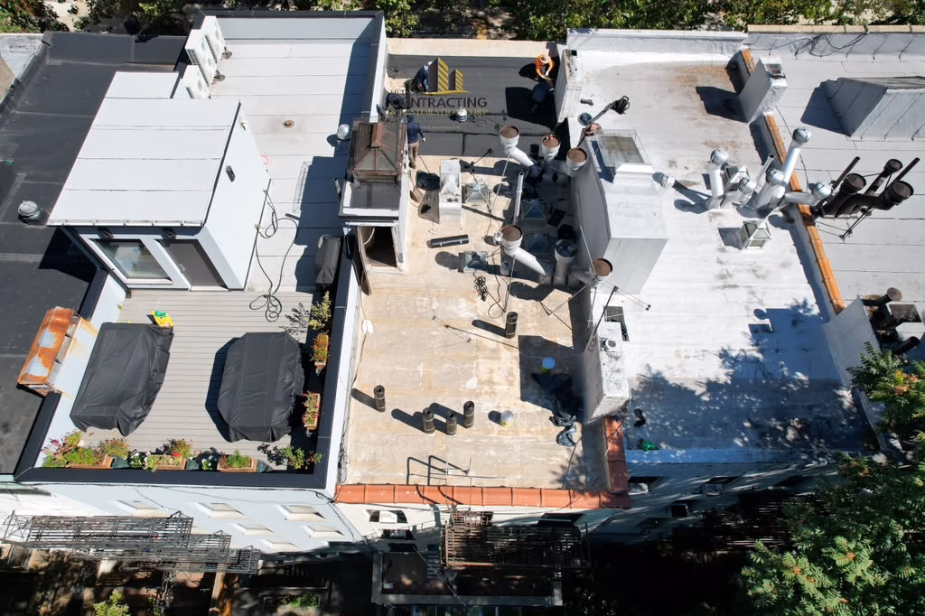 flat roof restoration east village manhattan with Johns manville roofing and gaco coating